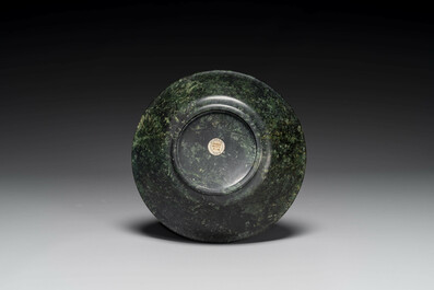 A Chinese dark green jade bowl, 18th C.