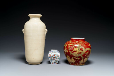 A Chinese cream-glazed vase and two 'dragon' vases, Jiajing and Wanli mark, 19/20th C.