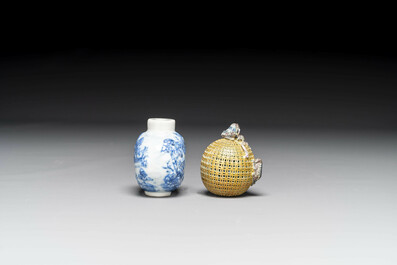 A Chinese blue and white snuff bottle and a famille rose openworked ball, 19th C.
