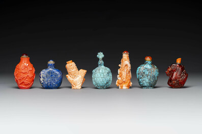 Seven varied Chinese snuff bottles of precious stone, red coral, glass and amber, 19th C.