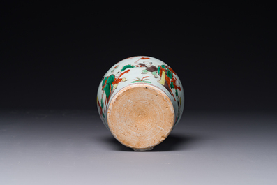 A small Chinese wucai jar with figures in a landscape, Transitional period