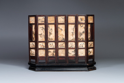 A Chinese seven-fold wooden table screen with painted marble plaques, 19th C.