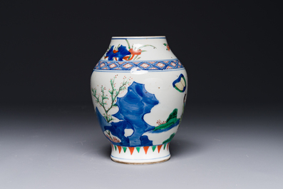 A Chinese wucai vase with figures and calligraphy, Transitional period