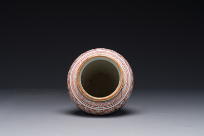 A small Chinese wucai jar with floral design, Transitional period