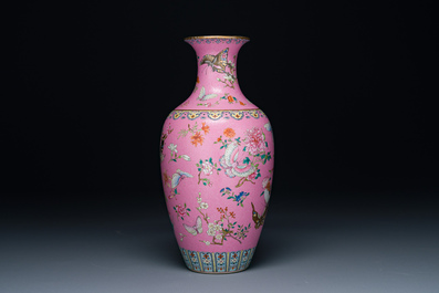 A Chinese pink-sgraffito-ground famille rose 'butterfly' vase, Qianlong mark and possibly of the period