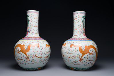 A pair of Chinese famille rose 'dragon' bottle vases, Tongzhi/Guangxu