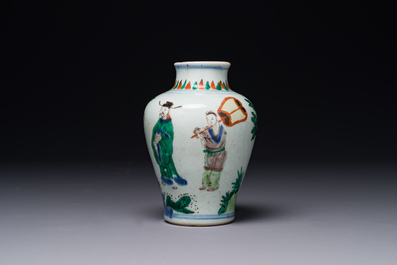 A small Chinese wucai jar with figures in a landscape, Transitional period