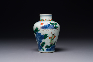 A small Chinese wucai jar with figures in a landscape, Transitional period