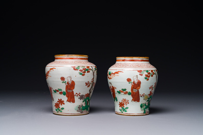 A pair of small Chinese wucai jars with figures in a landscape, Transitional period