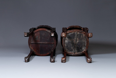 A pair of large Chinese carved wooden stands with marble tops, 19th C.