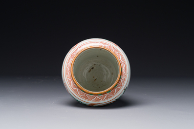 A small Chinese wucai jar with figures in a landscape, Transitional period