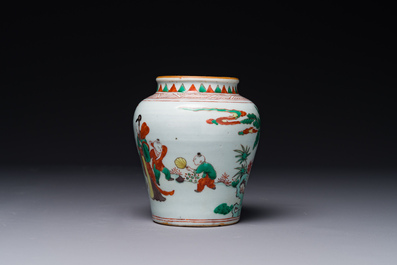 A small Chinese wucai jar with figures in a landscape, Transitional period