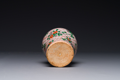 A small Chinese wucai jar with floral design, Transitional period