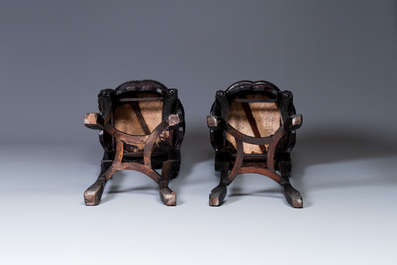 A pair of tall Chinese carved wooden stands with marble tops, 19th C.