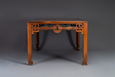 A large rectangular Chinese huanghuali wooden table, 19/20th C.