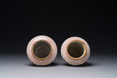 A pair of small Chinese wucai jars with figures in a landscape, Transitional period