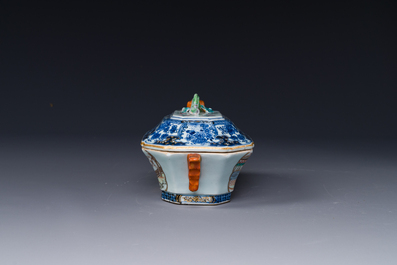 A Chinese Canton famille rose 'mandarin subject' tureen and cover on stand and a teapot and cover, Qianlong