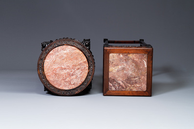 Two Chinese carved wooden stands with marble tops, 19th C.