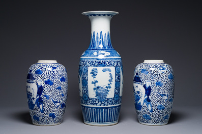 A pair of Chinese blue and white jars and a vase, Kangxi mark, 19th C.