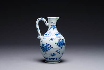 A Chinese blue and white ewer with floral design, Transitional period