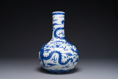 A Chinese blue and white 'dragon' bottle vase, Yongzheng mark, 19th C.