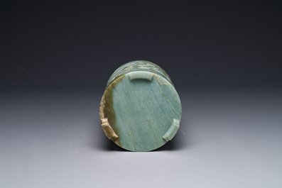 A Chinese spinach jade brush pot with relief design, 18th C.