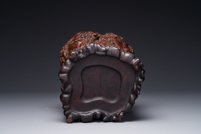 A large Chinese carved huanghuali wooden brush pot with Taoist design, 17/18th C.