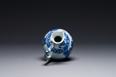 A Chinese blue and white ewer with figures in a landscape, Transitional period