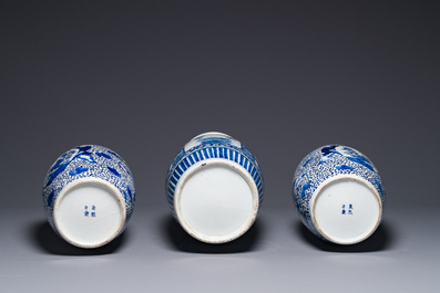 A pair of Chinese blue and white jars and a vase, Kangxi mark, 19th C.