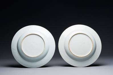 A pair of Chinese famille rose 'magpie and peony' plates with bianco-sopra-bianco rims, Yongzheng