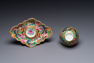 A Chinese Canton famille rose gilt-decorated cup and stand with flowers and butterflies, 19th C.