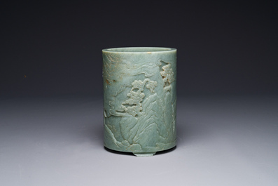 A Chinese spinach jade brush pot with relief design, 18th C.