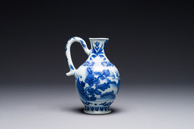 A Chinese blue and white ewer with figures in a landscape, Transitional period