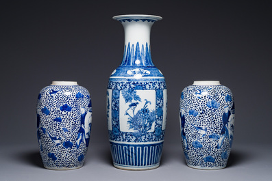 A pair of Chinese blue and white jars and a vase, Kangxi mark, 19th C.