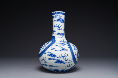 A Chinese blue and white 'dragon' bottle vase, Yongzheng mark, 19th C.