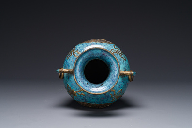A Chinese robin's egg and faux bronze-glazed 'hu' vase, Qianlong mark, 19th C.