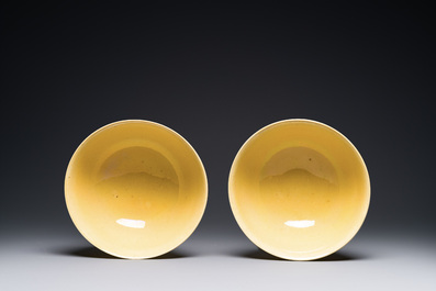 A pair of Chinese monochrome yellow-glazed bowls, Yongzheng mark, 19th C