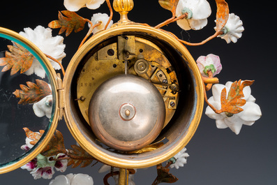 A French ormolu-mounted porcelain mantel clock, 18/19th C.
