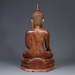 A large Burmese gilt lacquer Buddha in bhumisparsha mudra, 19/20th C.