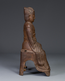 A Chinese cast iron figure of a dignitary, dated 1722