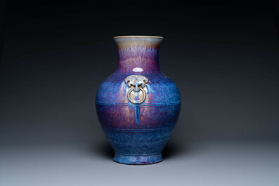 A large Chinese flamb&eacute; glaze 'hu' vase with taotie handles, Qing