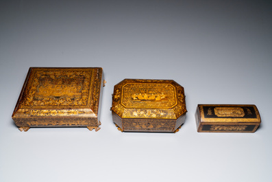 A large Chinese Canton gilt black lacquer tray, thee boxes and a fan, 19th C.