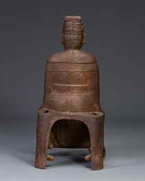 A Chinese cast iron figure of a dignitary, dated 1722