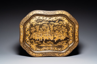 A large Chinese Canton gilt black lacquer tray, thee boxes and a fan, 19th C.