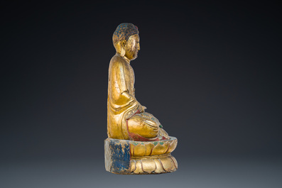 A large Chinese or Vietnamese polychromed and glit wooden Buddha, 19th C.