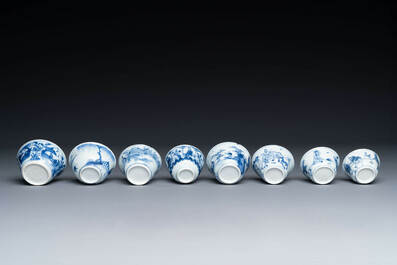 Thirteen Chinese blue and white saucers and twelve cups with figural design, Kangxi/Yongzheng