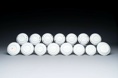 Thirteen Chinese blue and white saucers and twelve cups with figural design, Kangxi/Yongzheng