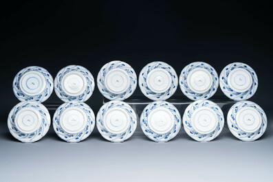 Twelve Chinese blue and white cups and saucers with floral design, jade mark, Kangxi