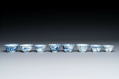 Thirteen Chinese blue and white saucers and twelve cups with figural design, Kangxi/Yongzheng