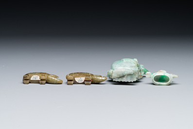 A pair of Chinese jade sculptures of elephants and a covered vase on wooden stands, 19th C.